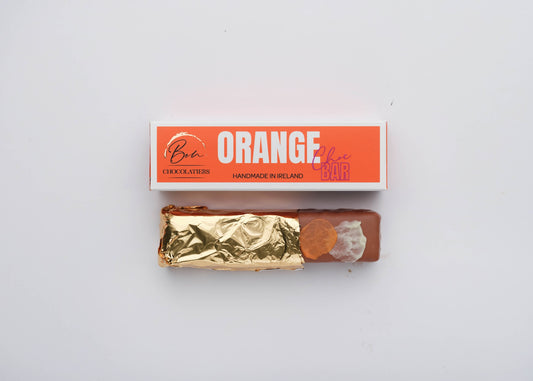 Gold-wrapped artisan Irish orange chocolate bar by Bon Chocolatiers, a luxury treat or corporate client gift