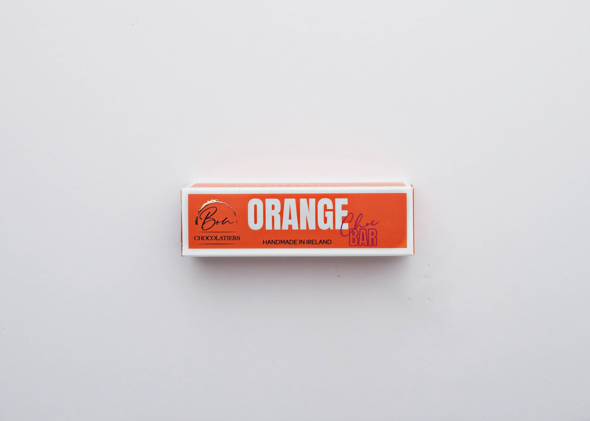 Handmade Irish orange chocolate bar by Bon Chocolatiers in branded box, a luxury birthday treat for foodies.