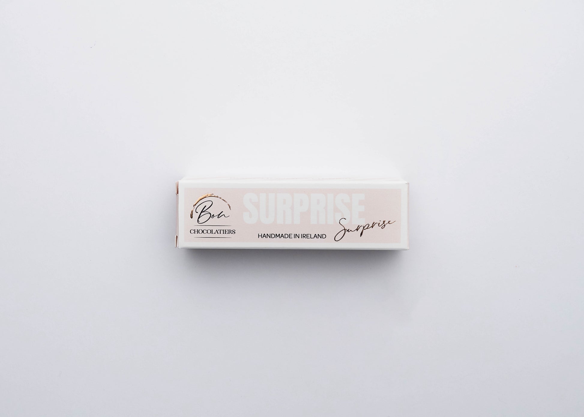 Handmade Irish Surprise Bar by Bon Chocolatiers in branded box, a fun birthday treat for foodies.